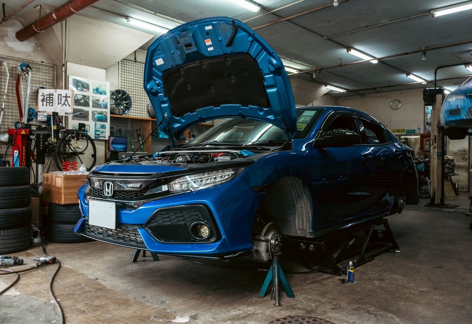 Car on a ramp in the workshop